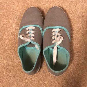 Gray and teal slip ons